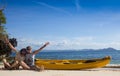 Couple canoeing in lagoon of West French indies