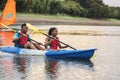 Couple canoeing in a lake Royalty Free Stock Photo
