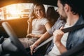 Couple at car dealership Royalty Free Stock Photo