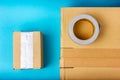 A couple of cardboard boxes and a roll of duct tape. Packing things. Royalty Free Stock Photo