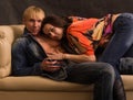 Couple caressing on sofa Royalty Free Stock Photo