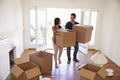 Couple Carrying Boxes Into New Home On Moving Day Royalty Free Stock Photo