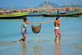 Couple carrying a fish