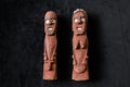 a couple of carved sculptures -Two African figures made by adults as toys for children