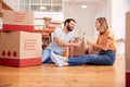 Couple Celebrating Moving Into New Home Drinking Champagne Royalty Free Stock Photo