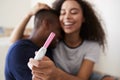 Couple Celebrating Positive Home Pregnancy Test Result Royalty Free Stock Photo