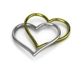 Couple of Chained Heart Shaped Golden and Silver Rings Royalty Free Stock Photo