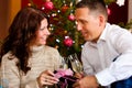 Couple with champagne on Christmas Eve Royalty Free Stock Photo