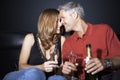 Couple With Champagne Flutes Rubbing Noses Royalty Free Stock Photo