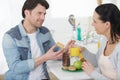 couple chatting while eating breakfast at home Royalty Free Stock Photo