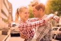 Couple in check shirts and denim hugging each other Royalty Free Stock Photo