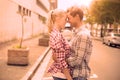 Couple in check shirts and denim hugging each other Royalty Free Stock Photo