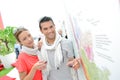 Couple checking map at wine fair Royalty Free Stock Photo