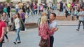 Couple with Child Makes Selfie on Litewski Square