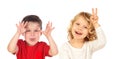 Couple of children doing jokes Royalty Free Stock Photo