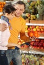 Couple chooses products in the store Royalty Free Stock Photo