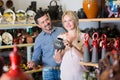 Couple choosing ceramic bowl