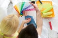 Couple choosing colors to paint new house Royalty Free Stock Photo