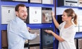 Couple choosing mailbox Royalty Free Stock Photo