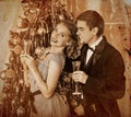 Couple on Christmas party.Sepia toned. Royalty Free Stock Photo