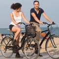 Couple on a city beach with bikes