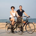 Couple on a city beach with bikes