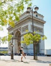 Couple on a citytrip in Paris visiting Avenue des Champs-Elysees Paris France Arc De Triomphe Royalty Free Stock Photo