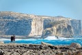 Couple on the cliffs of San Lawrenz, Gozo, Malta