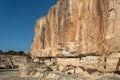 Couple climbing a steep mountain in Mallorca island