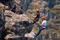 A couple climbing Table Mountain.