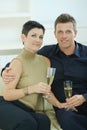 Couple clinking with champagne