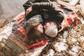 Couple close lying on plaid in winter park