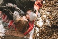 Couple close lying on plaid in winter park