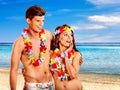 Couple with cocktail at beach. Royalty Free Stock Photo