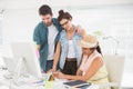 Couple with colleague working with colour wheel