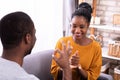 Couple Communicating With Sign Languages Royalty Free Stock Photo