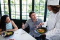 Couple complaining about the food to chef Royalty Free Stock Photo