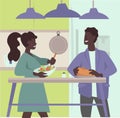 Couple cooking together and preparing meal in the kitchen