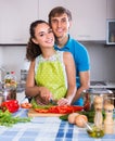 Couple cooking vegetables at kitchen Royalty Free Stock Photo