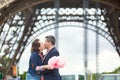 Couple with cotton candy in Paris