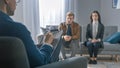 Couple on a Counseling Session with Psychotherapist. Foreground Focus on Back of the Therapist Royalty Free Stock Photo