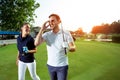 Couple at the course playing golf and looking happy Royalty Free Stock Photo