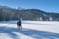 Couple cross-country skiing in beautiful nordic winter landscape in Leogang, Tirol, Alps, Austria Royalty Free Stock Photo