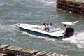 Sleek Open Fishing Skiff Powered By One Outboard Engine