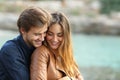 Couple cuddling affectionate on the beach Royalty Free Stock Photo