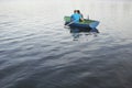 Couple Cuddling In Rowboat At Lake Royalty Free Stock Photo