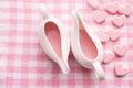 Couple cup of strawberries milk with pink heart shape on Beuatiful pink tablecloth texture background