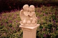 Couple cupid statue kissing