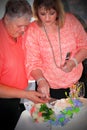 Couple Cutting Wedding Cake Royalty Free Stock Photo