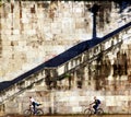 Couple cycling in the city, Tiber river, Rome, Italy